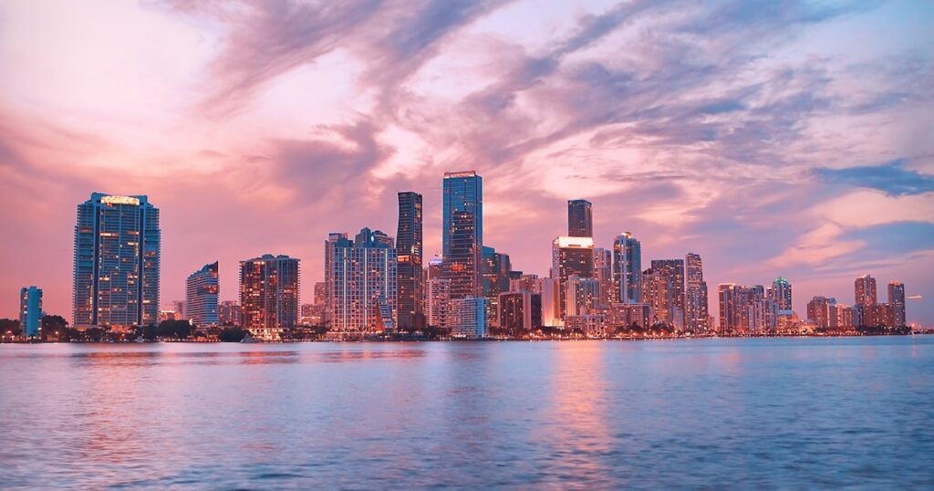 Downtown Miami and Brickell skyline at sunset over Biscayne Bay